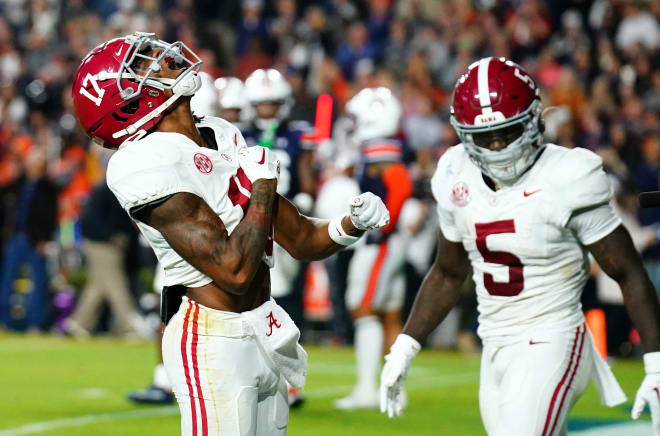 Alabama Crimson Tide wide receiver Isaiah Bond (17) celebrates his game winning touchdown in the end zone during the fourth quarter against the Auburn Tigers at Jordan-Hare Stadium. Photo | John David Mercer-USA TODAY Sports