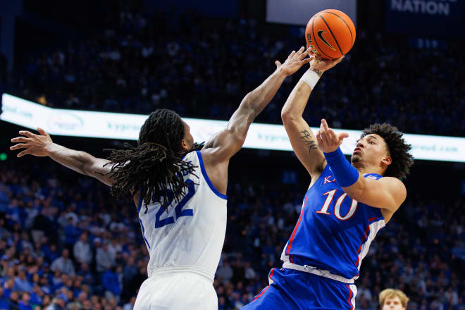 Kansas sustained a hot start by the Wildcats and held out through Kentucky's second-half push.