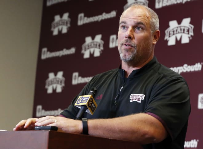 Mississippi State co-offensive coordinator John Hevesy speaks of the team's need to maintain a balanced offensive line this season to reporters during their NCAA college football media day, Monday, Aug. 1, 2016, in Starkville, Miss. (AP Photo/Rogelio V. Solis)
