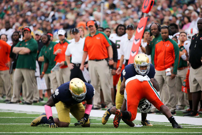 Julian Love, shown here making a tackle, was one of four Irish rookie defensive backs that helped hold Miami in check.