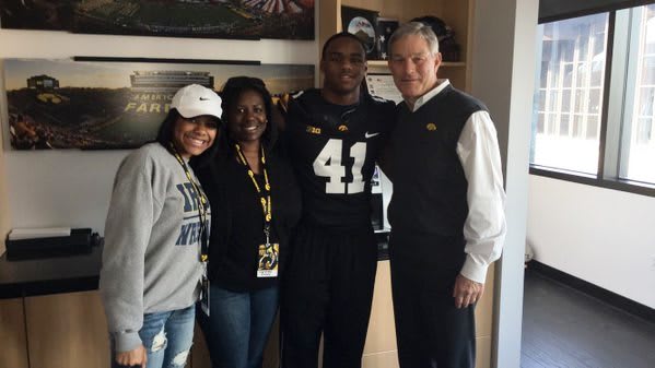 Markese Stepp and family with Iowa head coach Kirk Ferentz during his visit on Sunday.