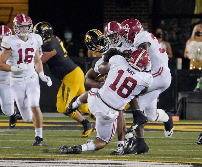 Missouri Tigers quarterback Shawn Robinson (3) looses his helmet as he is sacked by Alabama Crimson Tide defensive lineman LaBryan Ray (18) during the second half at Faurot Field at Memorial Stadium. Photo | Imagn
