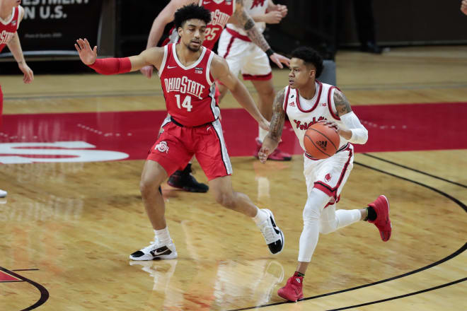 Jan 9, 2021; Piscataway, New Jersey, USA; Rutgers Scarlet Knights guard Jacob Young (42) dribbles as Ohio State Buckeyes forward Justice Sueing (14) defends during the first half at Rutgers Athletic Center (RAC). 