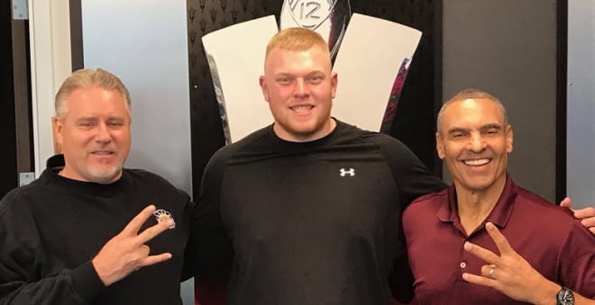 Lovell flanked by ASU's head coach hewrms Edwards (right) and offensive line coach Dave Christensen