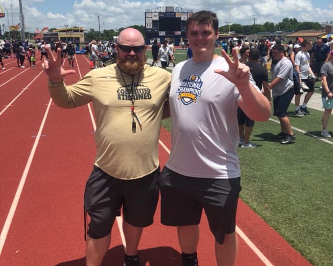 Jaret Porterfield with offensive line coach Cameron Norcross