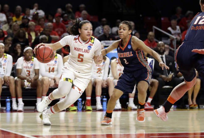 Destiny Slocum drives baseline in an NCAA Tournament game