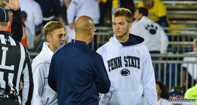 Shrader meets with head coach James Franklin before the Michigan game last October. 