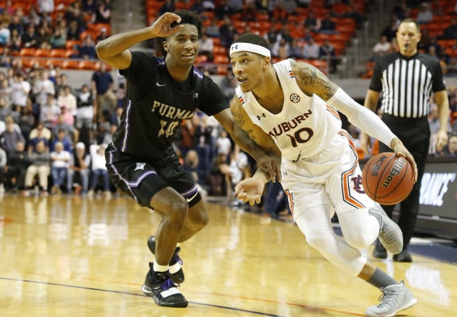 Auburn senior wing Samir Doughty leads the Tigers in scoring with an average of 17.3 points per game.