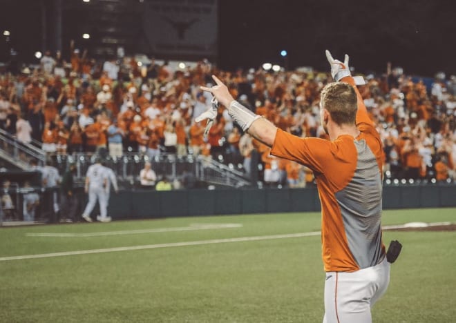 Eric Kennedy celebrates his walk-off hit. (@TexasBaseball)