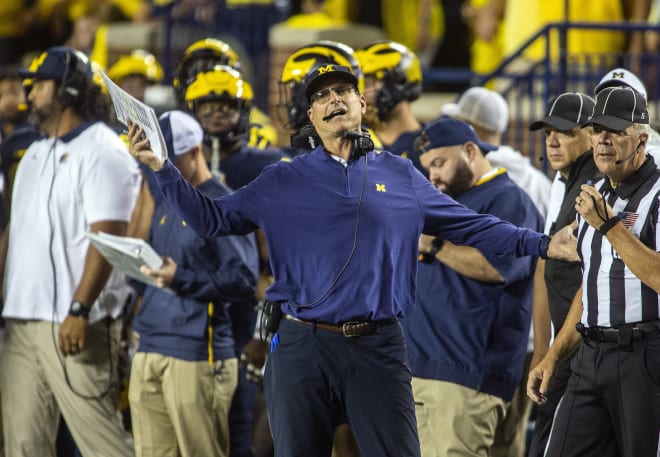 Michigan Wolverines head football coach Jim Harbaugh picked up his 53rd victory at U-M Saturday.