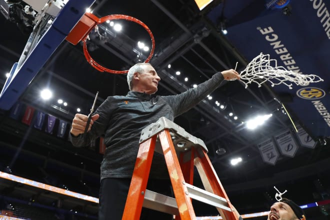 Mar 13, 2022; Tampa, FL, USA; Tennessee Volunteers head coach Rick Barnes cuts down the net after defeating the Texas A&M Aggies at Amalie Arena.