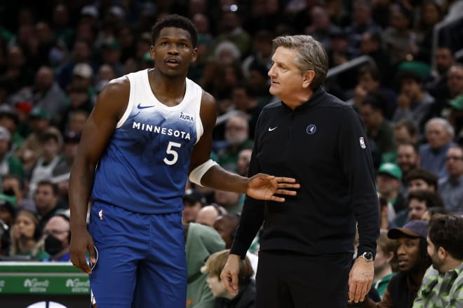 Minnesota Timberwolves head coach Chris Finch talks with guard Anthony Edwards (5) during the second quarter against the Boston Celtics at TD Garden. Mandatory Credit: Winslow Townson-USA TODAY Sports