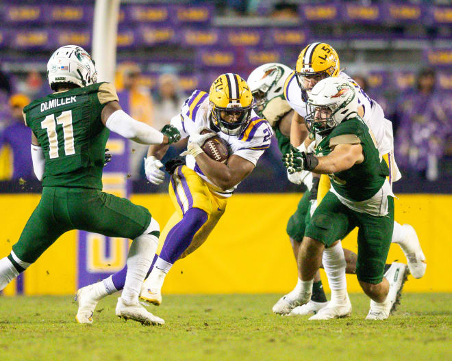 LSU running back Noah Cain ran for three touchdowns in the Tigers' 41-10 victory over UAB Saturday night in Tiger Stadium.,