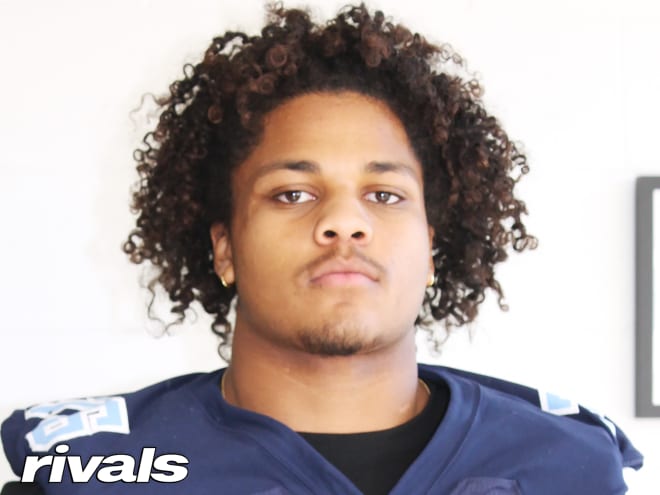 Wilmington (N.C.) Hoggard High senior tackle Michael Gibbs picked NC State over Virginia Tech and Duke on Sunday.