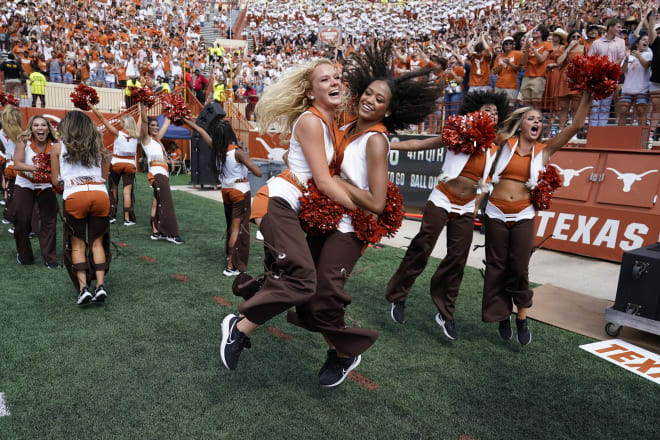 I can't decide if I think the Texas cheerleader outfits are hot or ridiculously stupid or both. 