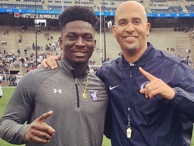 Asamoah and head coach James Franklin before the game Saturday.