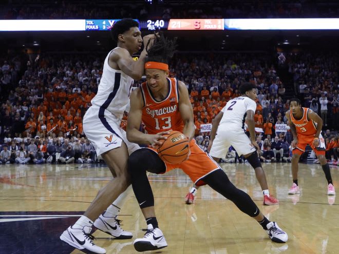 Dec 2, 2023; Charlottesville, Virginia, USA; Syracuse Orange forward Benny Williams (13) drives to the basket as /v`13/ defends during the first half at John Paul Jones Arena. Mandatory Credit: Geoff Burke-USA TODAY Sports