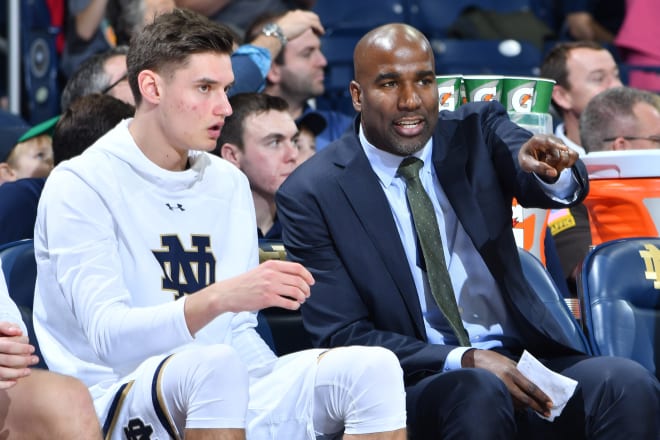 Notre Dame assistant coach Ryan Humphrey (right) is moving on after six seasons with head coach Mike Brey.