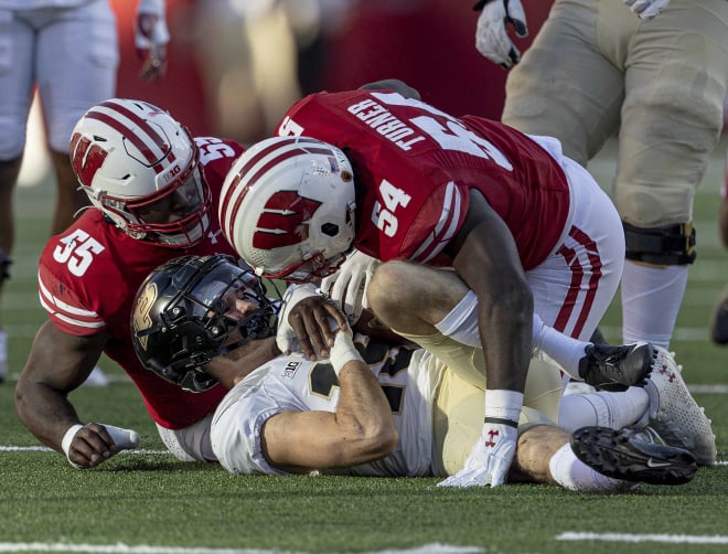 Wisconsin inside linebackers Jordan Turner and Maema Njongmeta.