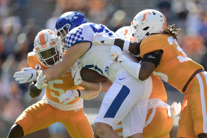 Kentucky tight end Justin Rigg fought for yards after a catch in Saturday's game at Neyland Stadium.