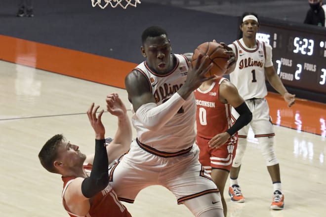 Illinois center Kofi Cockburn (21) comes down with one of his 14 rebounds during Illinois' home victory over Wisconsin.