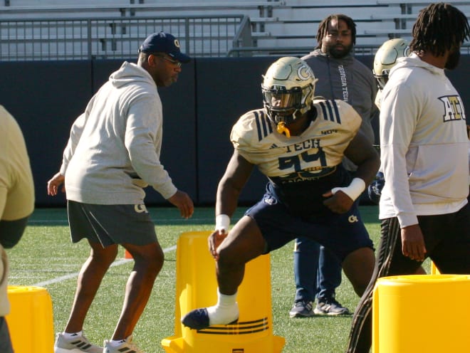 Douse working with DT coach David Turner in the preseason 