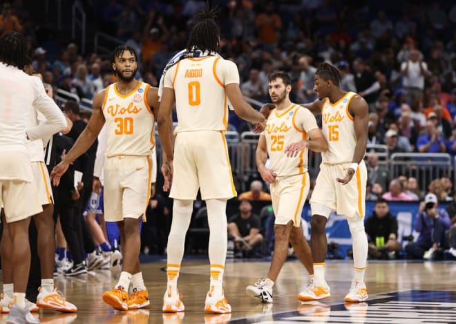 Mar 18, 2023; Orlando, FL, USA; Tennessee Volunteers guard Santiago Vescovi (25) and Tennessee Volunteers guard Jahmai Mashack (15) react as they head to the bench against the Duke Blue Devils during the second half in the second round of the 2023 NCAA Tournament at Legacy Arena. 