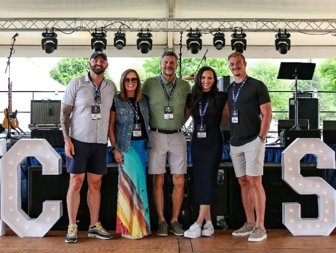 Former Notre Dame football player Mike Golic Jr. (far left) is flanked by mom Chris, dad Mike Sr,, sister Sydney and Sydney's husband, Ben Braunecker.