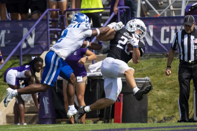 Duke's Jaylen Stinson shoves Northwestern running back Evan Hull during a touchdown in Saturday's game. 