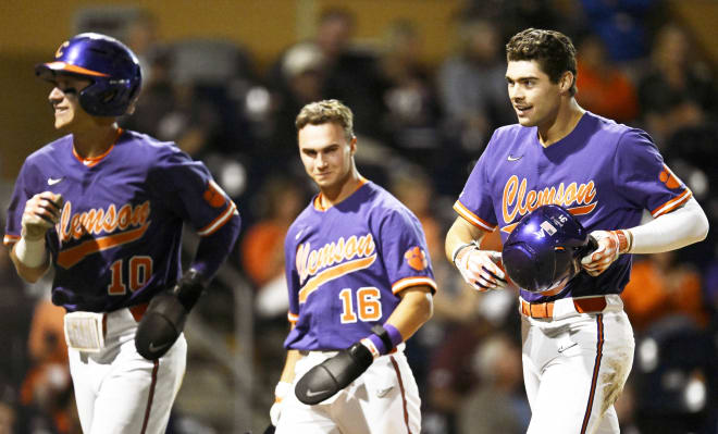 Zane Denton of the Tennessee Volunteers runs the bases after hitting  News Photo - Getty Images