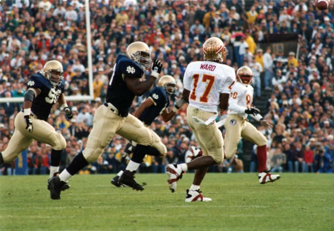 Bryant Young and the Notre Dame Fighting Irish versus Charlie Ward and the Florida State Seminoles at South Bend in 1993