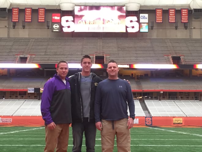 Notre Dame Fighting Irish football quarterback Jack Coan with his dad Mike and uncle Dan