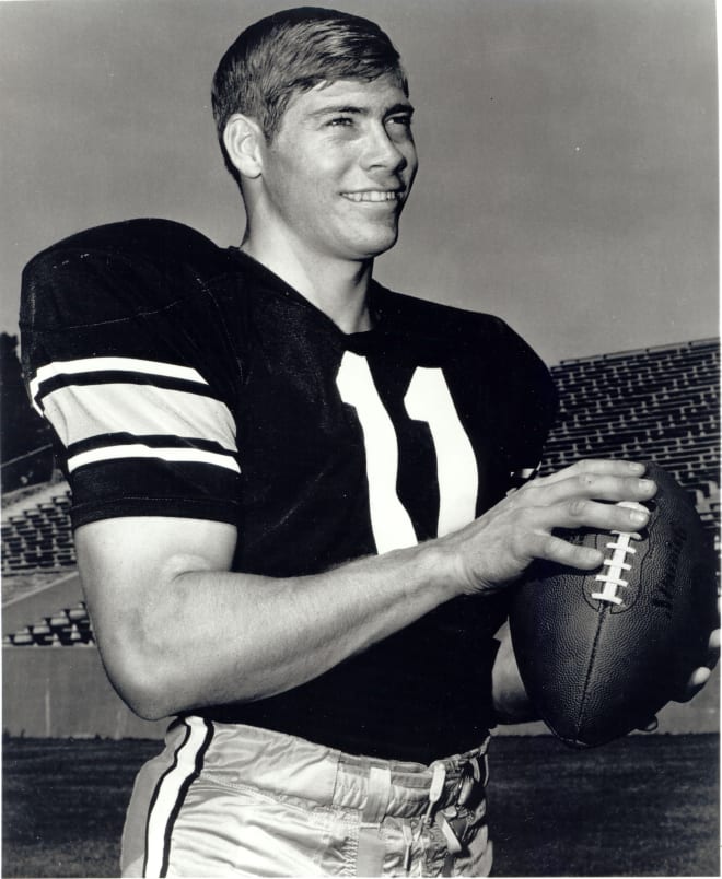 Bobby Anderson poses for a photograph session at Folsom Field 