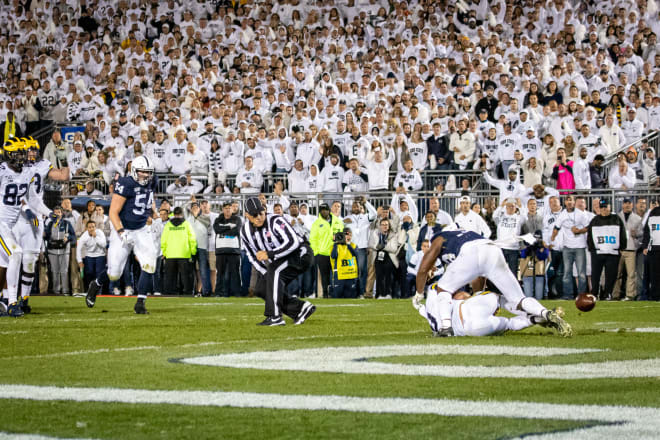 Ronnie Bell's dropped pass secured Michigan's 28-21 loss at Penn State.