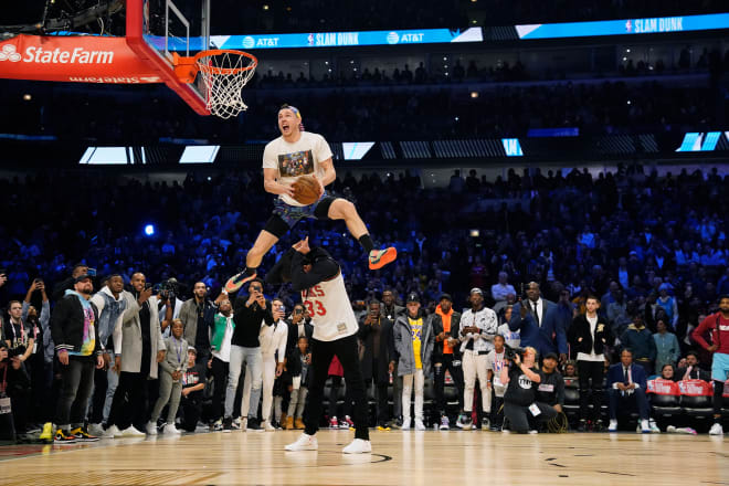 Former Notre Dame men's basketball player Pat Connaughton in competing in the 2020 NBA Slam Dunk Contest, where he dunked over Brewers outfielder Christian Yelich and Buck teammate Giannis Antetokounmpo (Photo Courtesy of the NBA)..