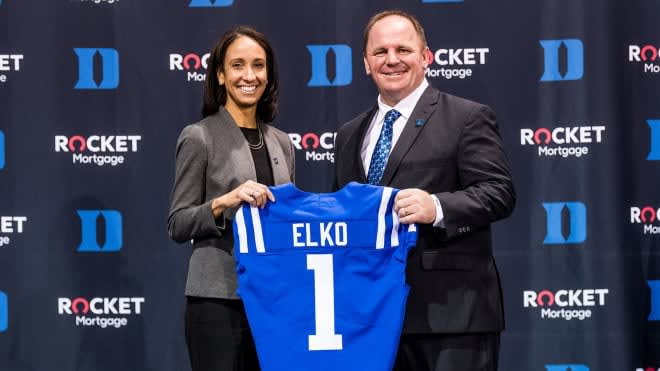 Duke athletics director Nina King, left, and football coach Mike Elko pose during Elko's introduction press conference in December. 