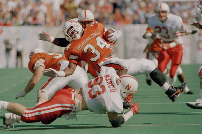 Heading into the 1987 Nebraska vs. Oklahoma State game, Cowboy running back Thurman Thomas was leading the nation in rushing yards. 