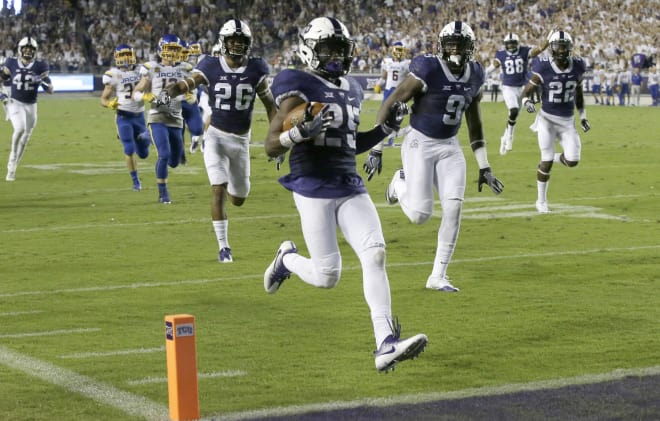 purple and white football jersey