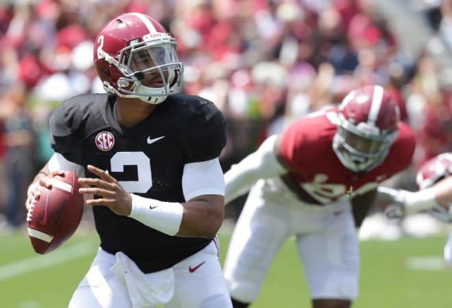 Alabama quarterback Jalen Hurts looks downfield during A-day. Photo | USA Today