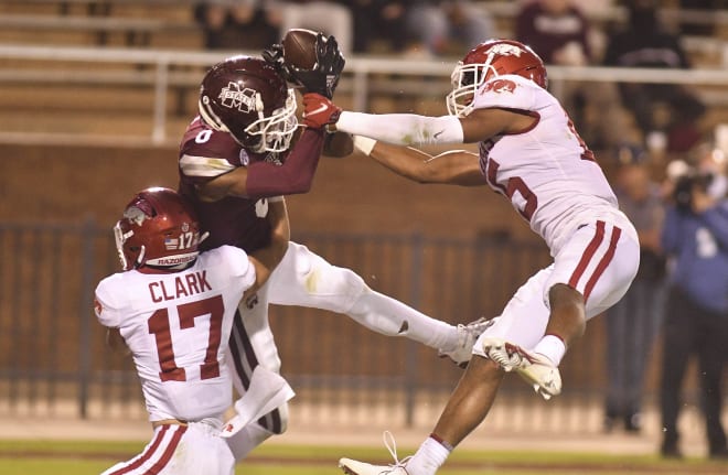 Hudson Clark and Simeon Blair combine for a pass breakup in the endzone against Mississippi State.