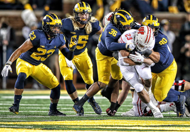 Wisconsin running back Jonathan Taylor has been held out of the end zone by U-M the last two years, but still averaged 6.5 yards per carry against their stout defenses. 