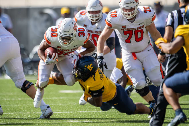 The West Virginia football team struggled to contain Oklahoma State's uptempo offense on Saturday.
