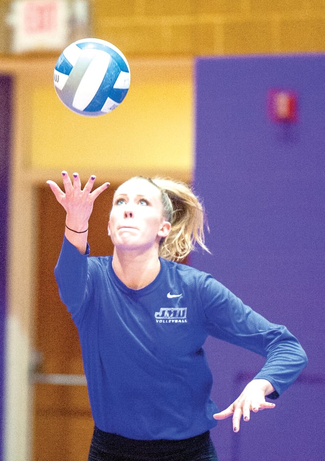 Janey Goodman prepares to serve during a James Madison practice in October.