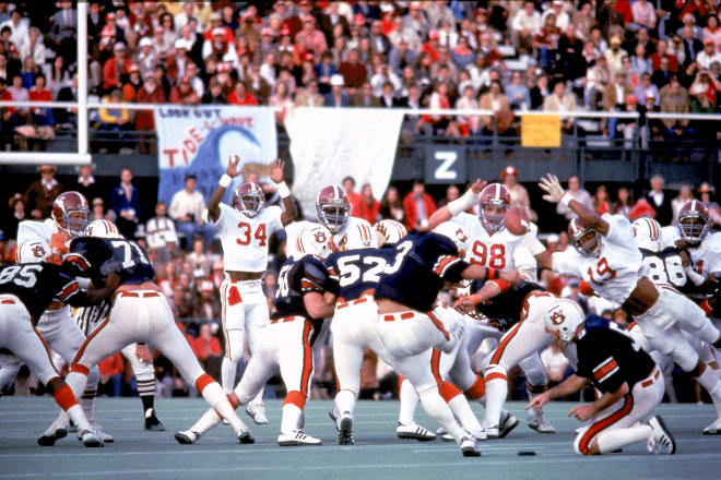 Alabama and Auburn play in the 1981 Iron Bowl. Photo | Alabama Athletics.