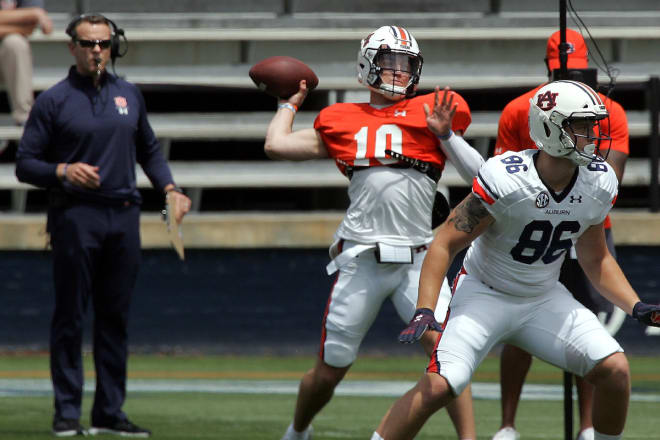 Harsin looks on as Nix throws a pass during the A-Day game.