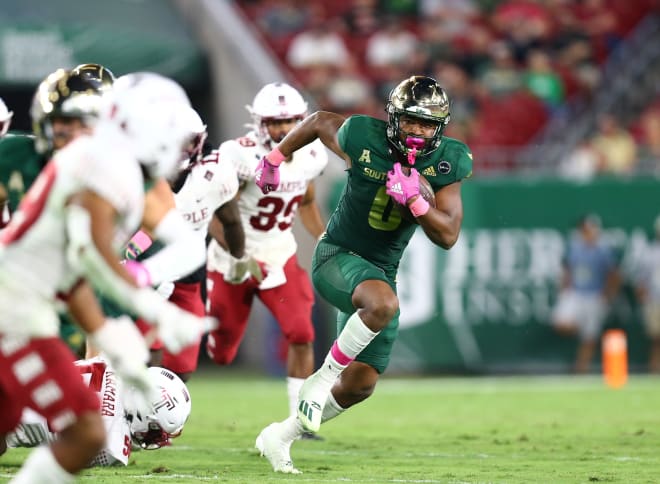 Jaren Mangham runs through the Temple defense in USF's 34-14 win over the Owls.  Photo Credit: USF Athletics