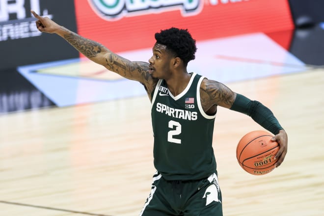 Watts playing some point guard for the Spartans during the Big 10 Conference Tournament in March