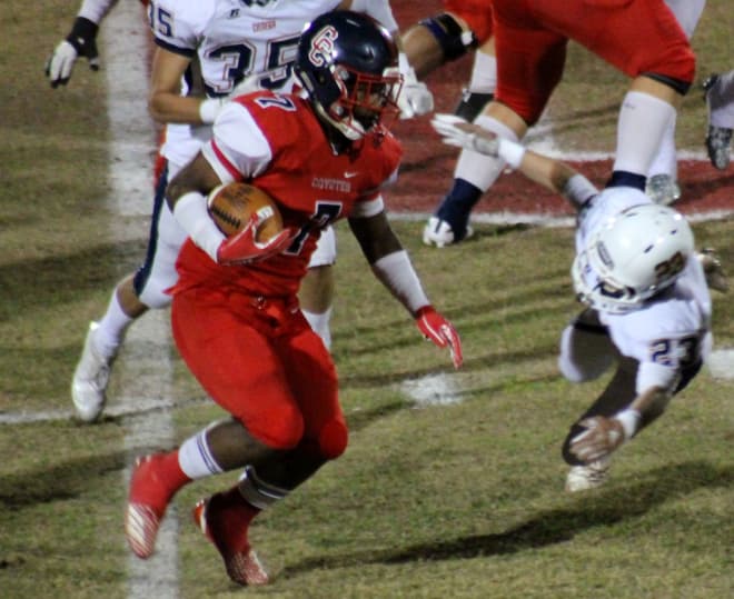 Centennial running back Tawee Walker gains some yardage during a home playoff game against Cienega in November.  The transfer from Nevada scored twice against the Bobcats and had 19 TDs on the season.