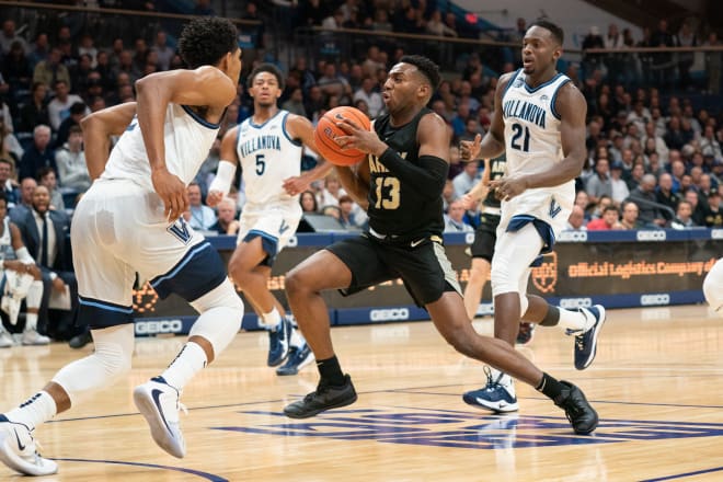 Army Black Knights guard Lonnie Grayson (13) drives the lane against the Villanova Wildcats during the first half