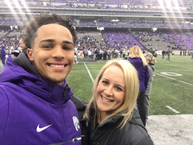 Lance Robinson and his mother on the official visit in Manhattan. The purple coat, though...